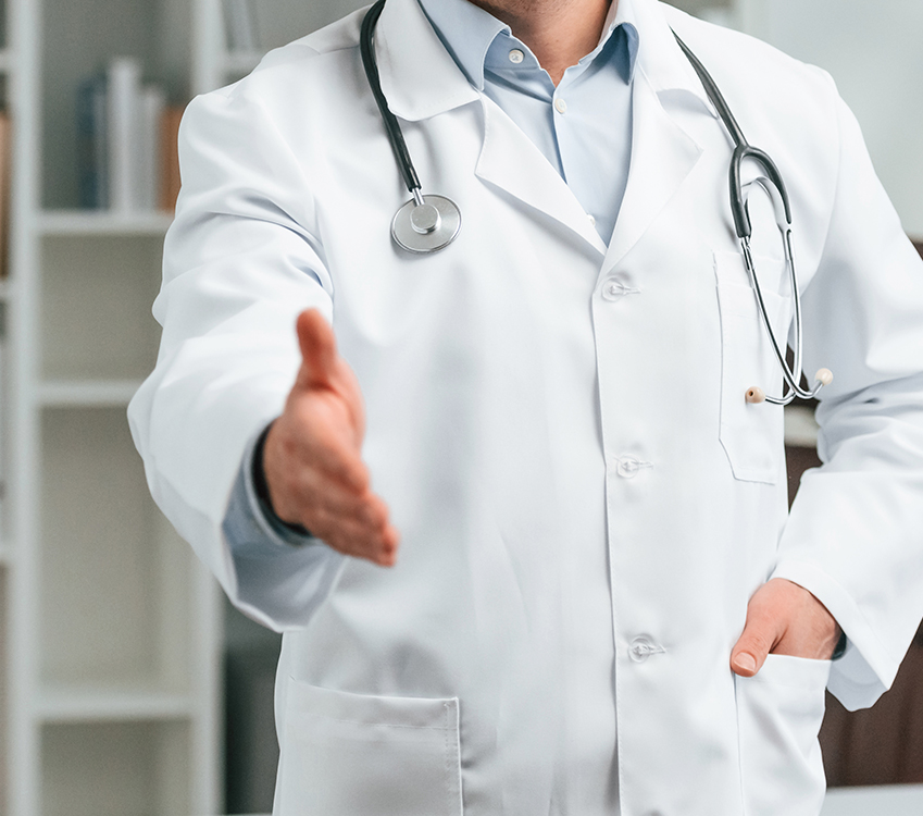 With stethoscope. Doctor in formal clothes is working in the cabinet